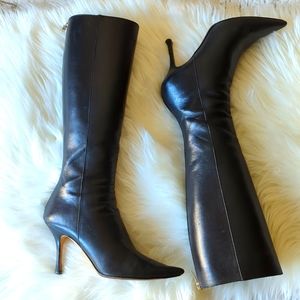 Knee length Jimmy Choo black boots.